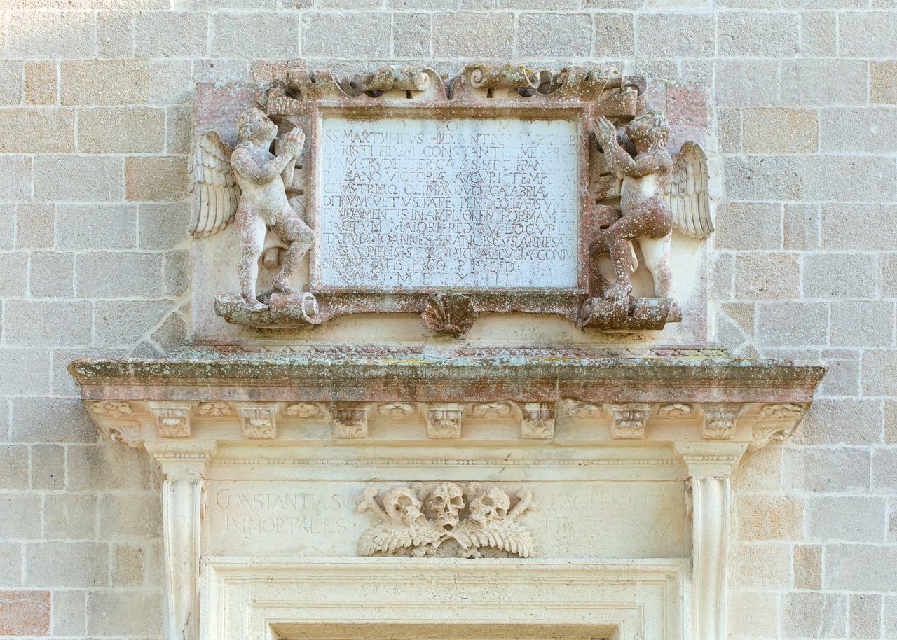 Plaque over the portal of Santa Maria dei Martiri, at the location where 800 inhabitants were supposedly beheaded in Apulia, Italy, April 18, 2025. (Photo via Wikimedia)