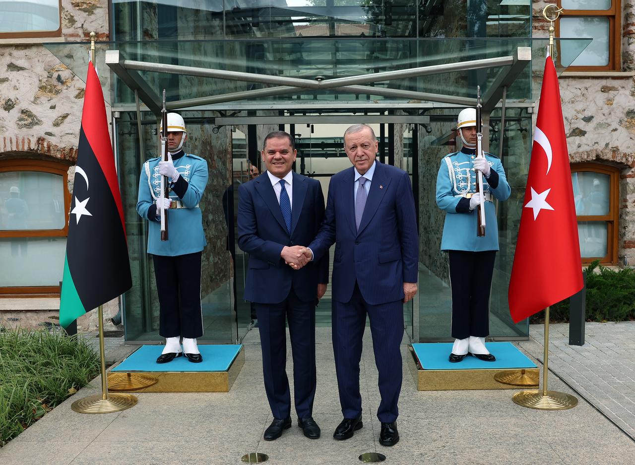 Turkish President Recep Tayyip Erdogan (R) receives Italian Prime Minister Giorgia Meloni (not seen) and Libyan Prime Minister Abdul Hamid Dbeibeh (L) at Dolmabahce Working Office in Istanbul, Türkiye on August 1, 2025. (Turkish Presidency / AA Photo)