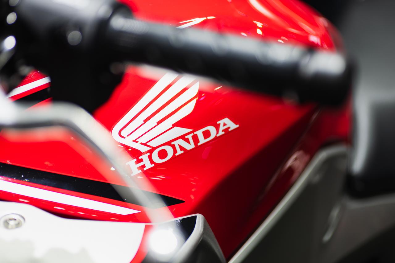 Honda logo on the body of sports motorbike at a car show. Honda is a one of the famous manufacture of automobiles, motorcycles and power equipment, Bangkok, Thailand, Dec. 5, 2019. (Adobe Stock Photo)
