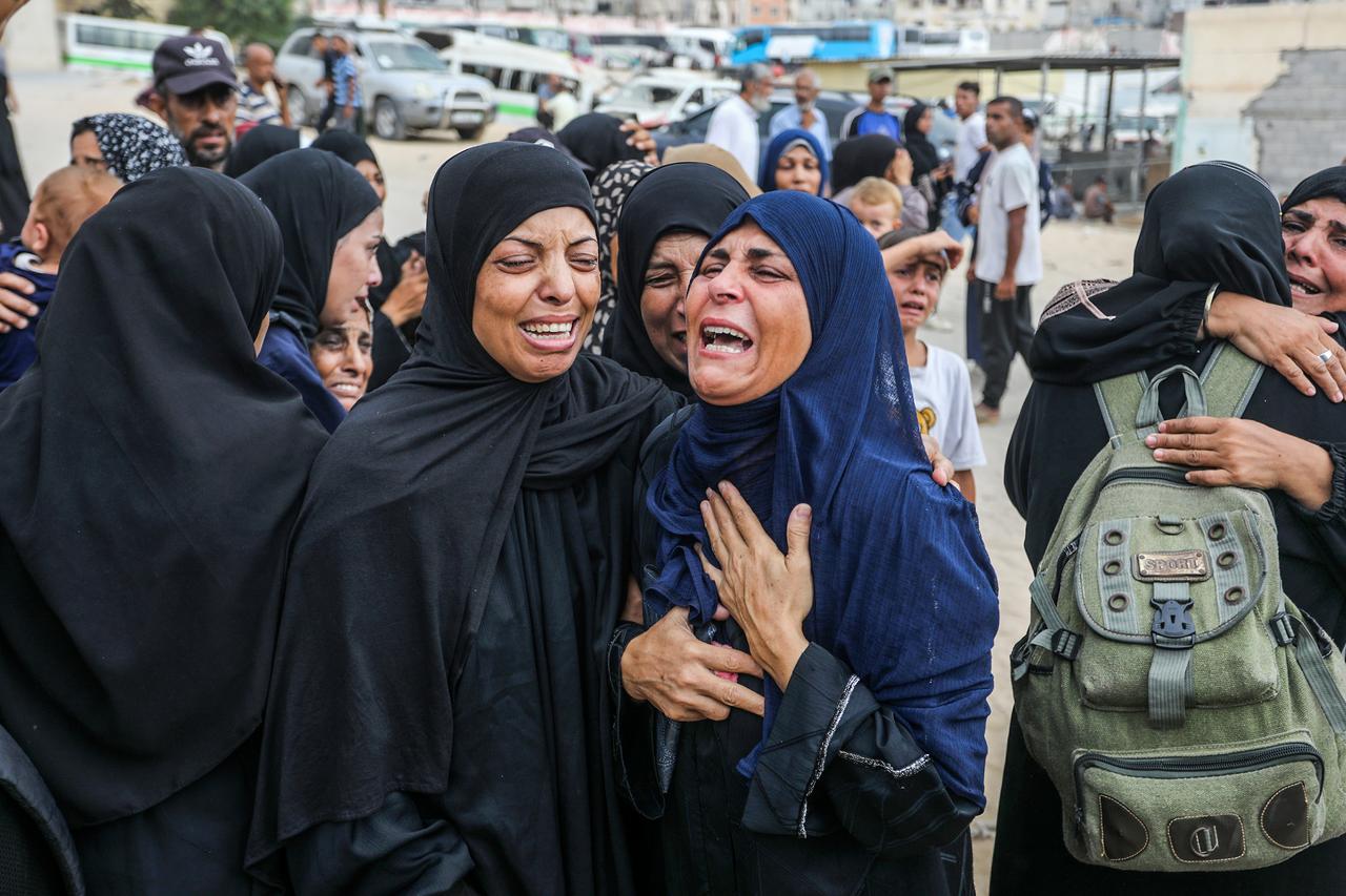 Relatives mourn as the Palestinians killed in Israeli attack on al-Mawasi area, are brought to Nasser Hospital for funeral procedures in Khan Yunis, Gaza on August 1, 2025. (AA Photo)