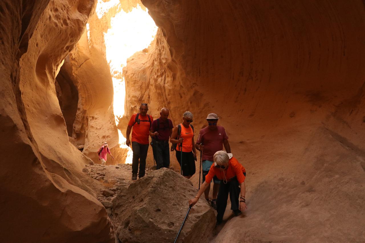 Travelers hike through Avla Canyon in Yesilhisar district of Kayseri, Türkiye, July 31, 2025. (AA Photo)
