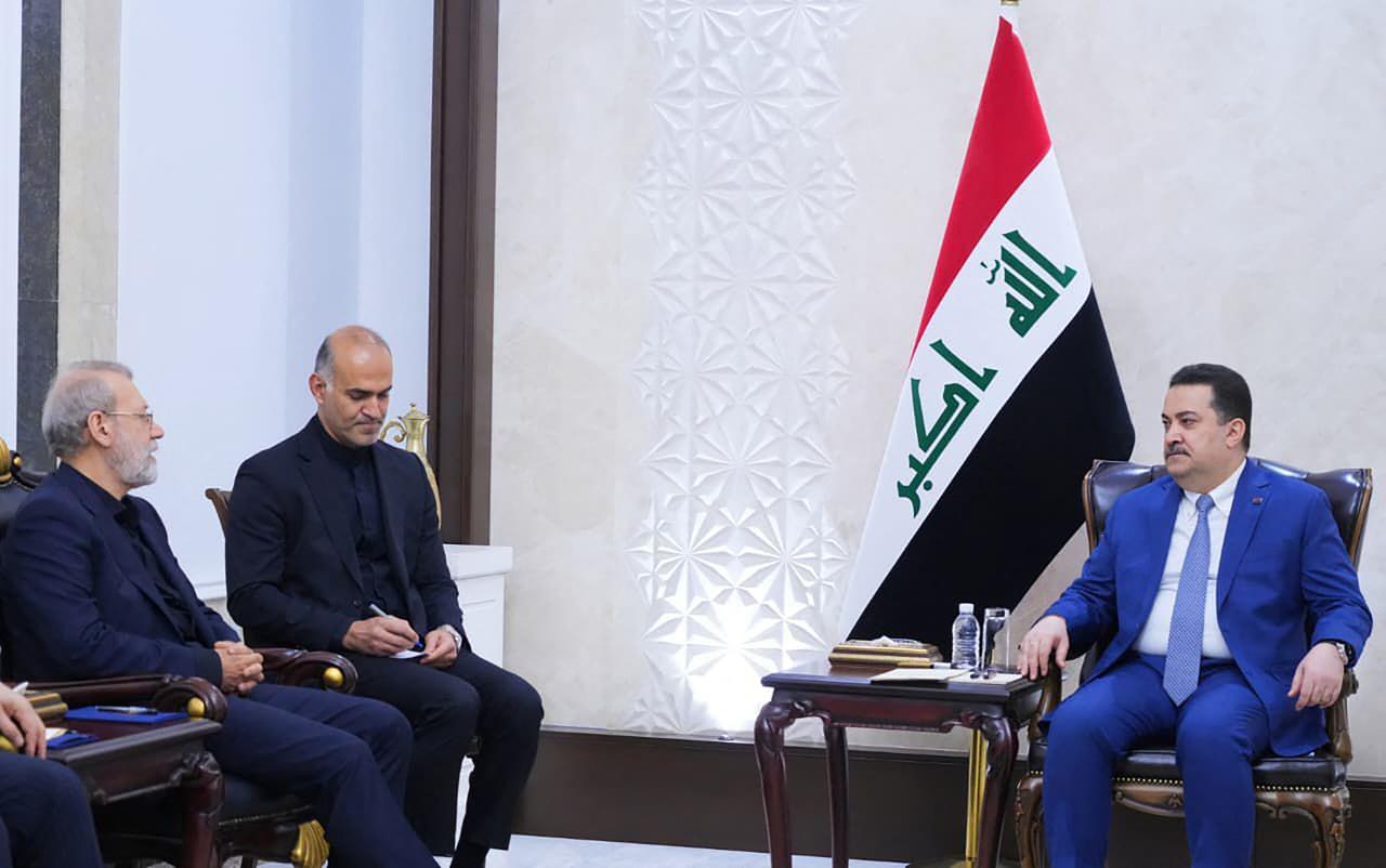 A handout picture released by Iraq's Prime Minister's Media Office shows Prime Minister Mohammed Shia al-Sudani (R) meeting with Ali Larijani (L), Iran's head of the National Security Council, in Baghdad, Iraq, August 11, 2025. (AFP Photo)
