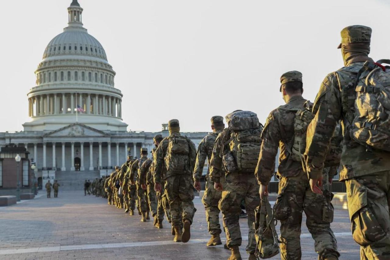 Members of the National Guard arrive at the U.S. Capitol to assist with security ahead of then President-elect Joe Bidens inauguration on January 15, 2021. (Getty Images)