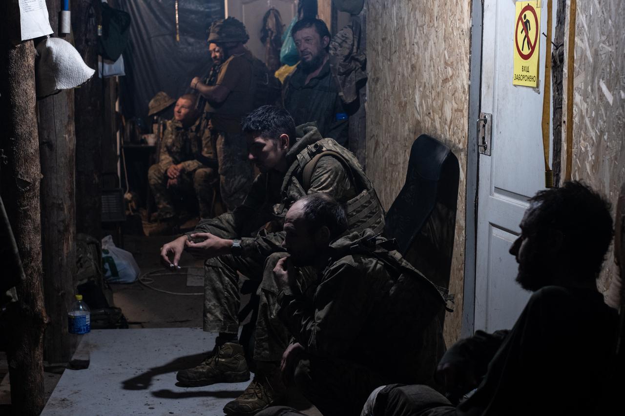 Ukrainian soldiers, who have just returned from frontline positions after months of fighting, rest in a shelter at an undisclosed location in Donetsk region. (Photo by Iryna Rybakova / The 93rd Kholodnyi Yar Separate Mechanized Brigade / AFP)
