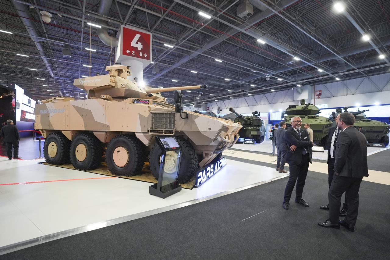 People visit FNSS stand with Pars Alpha visible during IDEF 2025, at the Istanbul Expo Center in Istanbul, Türkiye on July 22, 2025. (AA Photo)