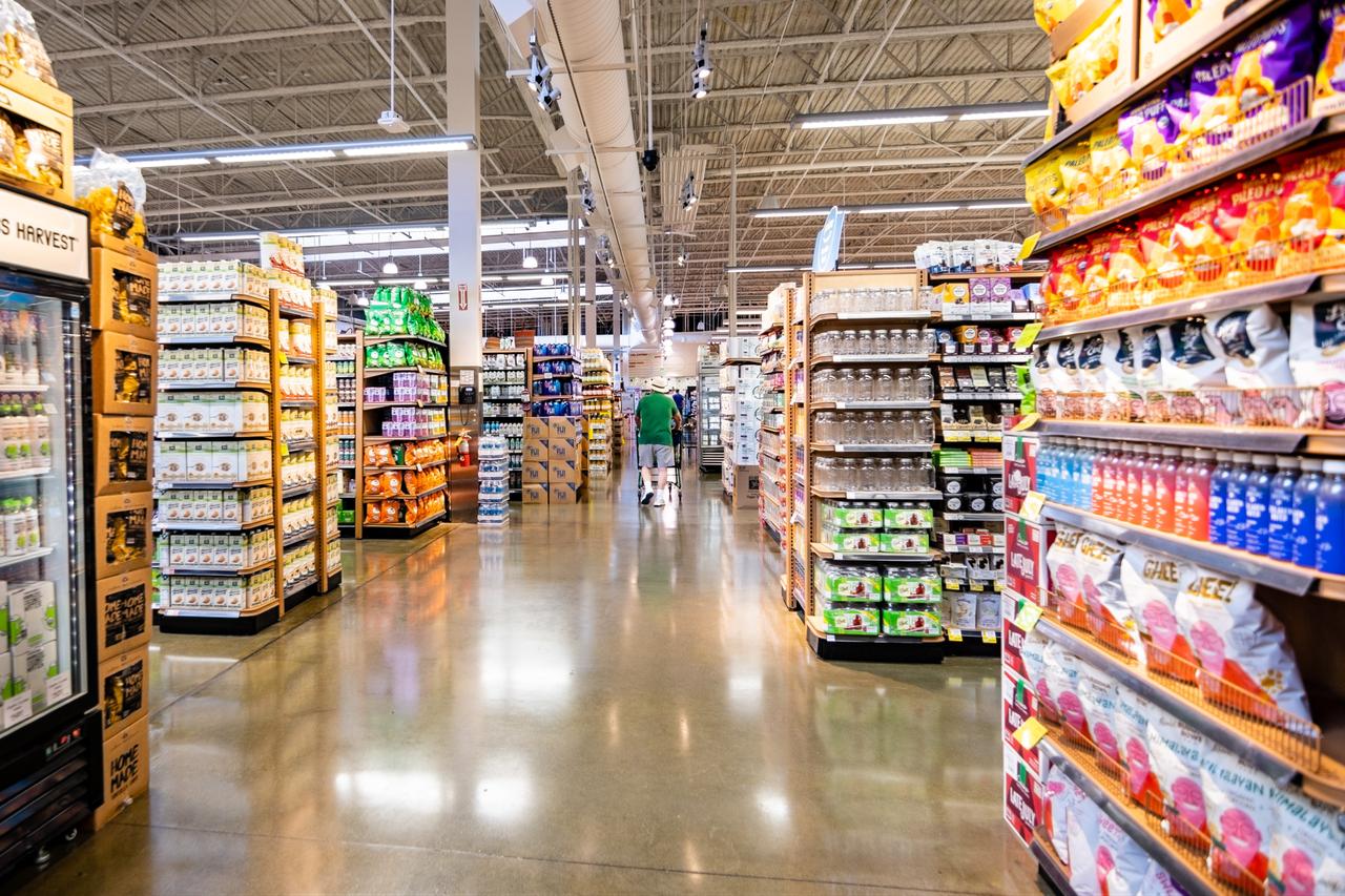 A customer walks through an aisle at a Whole Foods store in Cupertino, California, US, June 20, 2019. (Adobe Stock Photo)