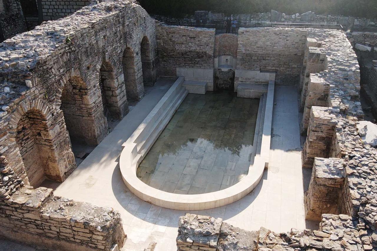Water was released into the pool of the Roman bath in the ancient city of Stratonikeia, located in Yatagan district of Mugla, Türkiye, after the completion of excavation and restoration works, August 10, 2025. (AA Photo)