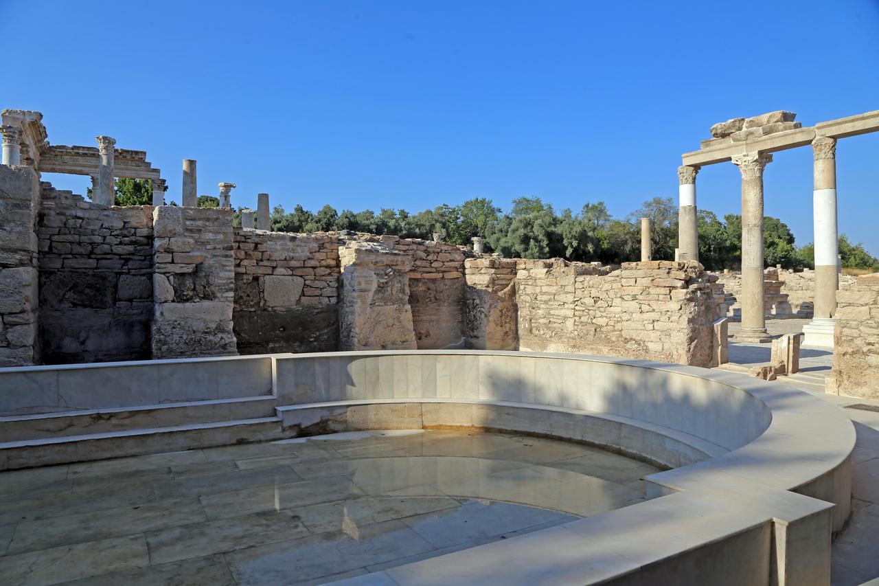 Water was released into the pool of the Roman bath in the ancient city of Stratonikeia, located in Yatagan district of Mugla, Türkiye, after the completion of excavation and restoration works, August 10, 2025. (AA Photo)