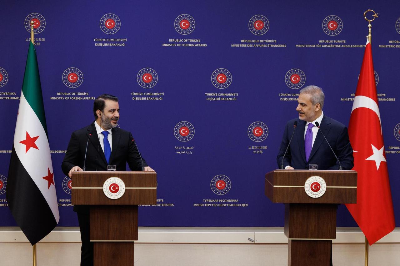 Foreign Minister Hakan Fidan (R) and Syrian Foreign Minister Asaad Hassan Al-Shaibani (L) hold a joint press conference in Ankara, Turkiye on August 13, 2025. (AA Photo)