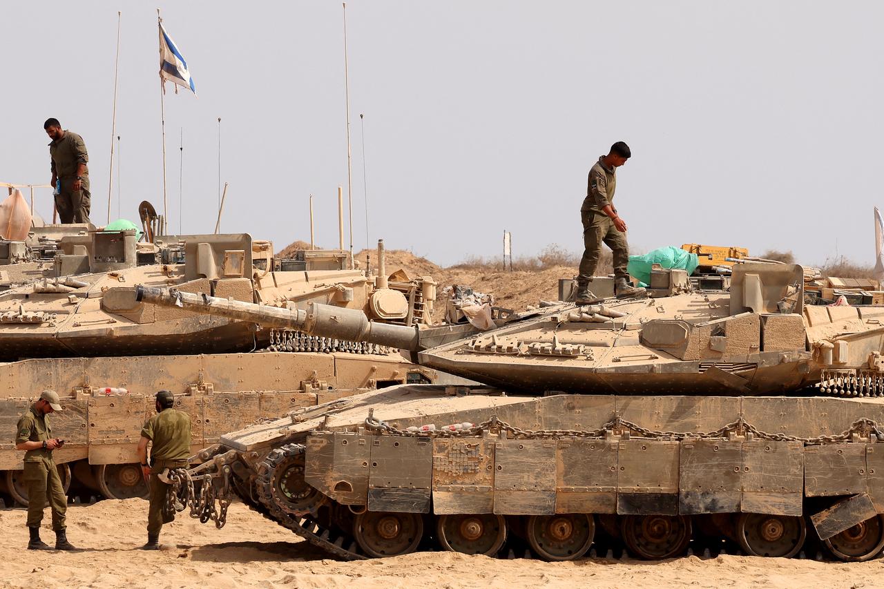 Israeli troops deploy at the border with the Gaza Strip, on August 13, 2025. (AFP Photo)
