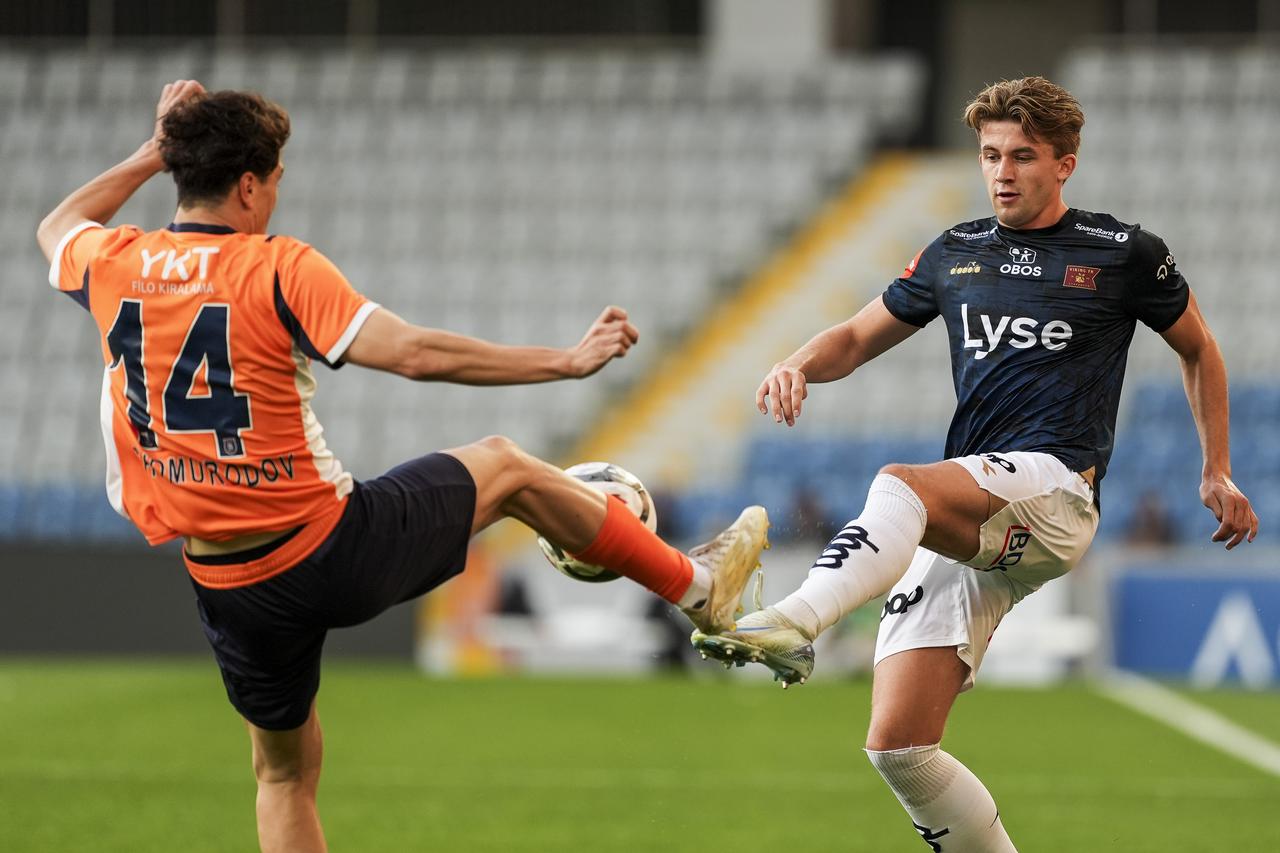 Eldor Shomurodov (L) of Basaksehir in action against Henrik Heggheim (R) of Viking during the UEFA Conference League third qualifying round second leg match between Basaksehir and Viking at Basaksehir Fatih Terim Stadium in Istanbul, Türkiye on August 13, 2025. (AA Photo)