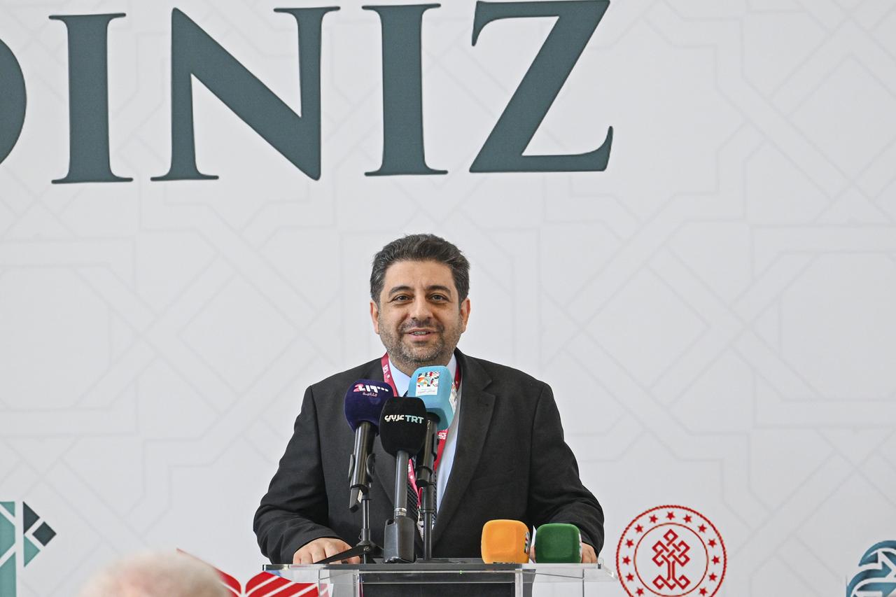 Arabic Book Fair General Coordinator Mehmet Agırakca delivers a speech during the event, August 9, 2025. (AA Photo)