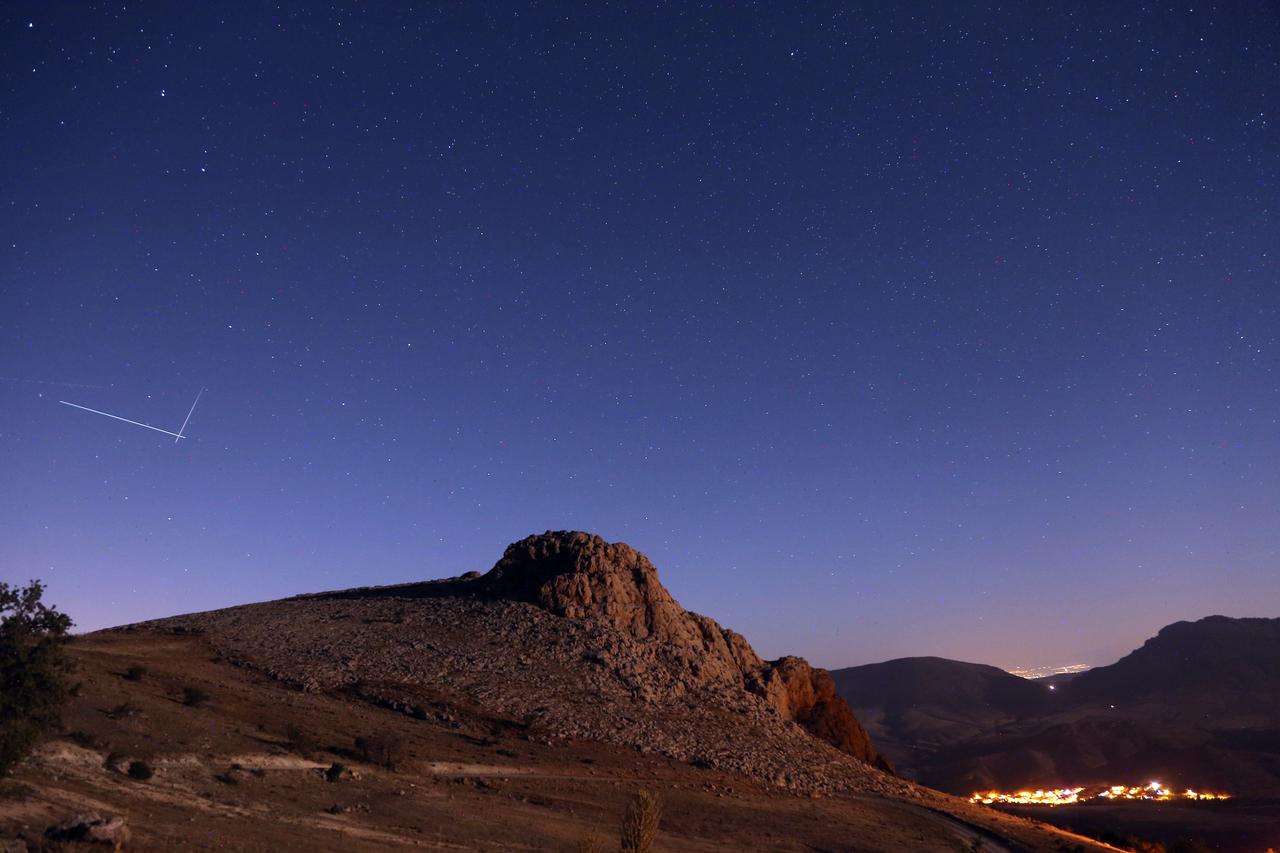 Perseid meteor shower is captured with long-exposure photography in Kayasaray Neighborhood, Halkapinar district of Konya, Türkiye, August 12, 2025. (AA Photo)