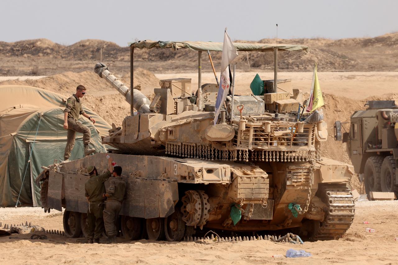 Israeli troops deploy at the border with the Gaza Strip, on August 13, 2025. (AFP Photo)