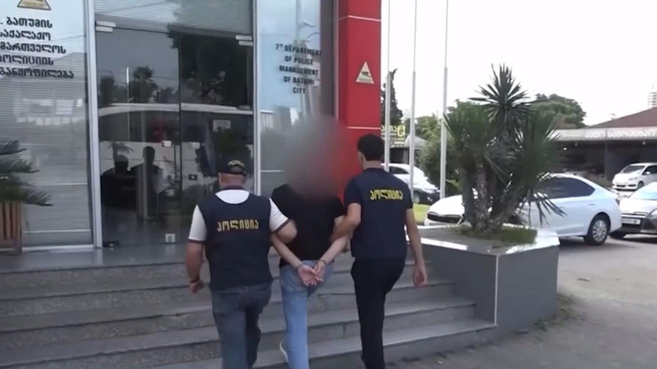 Georgian police officers escort criminals in Georgia in joint operation in Georgia on August, 2025. (Photo via Turkish Interior Ministry)