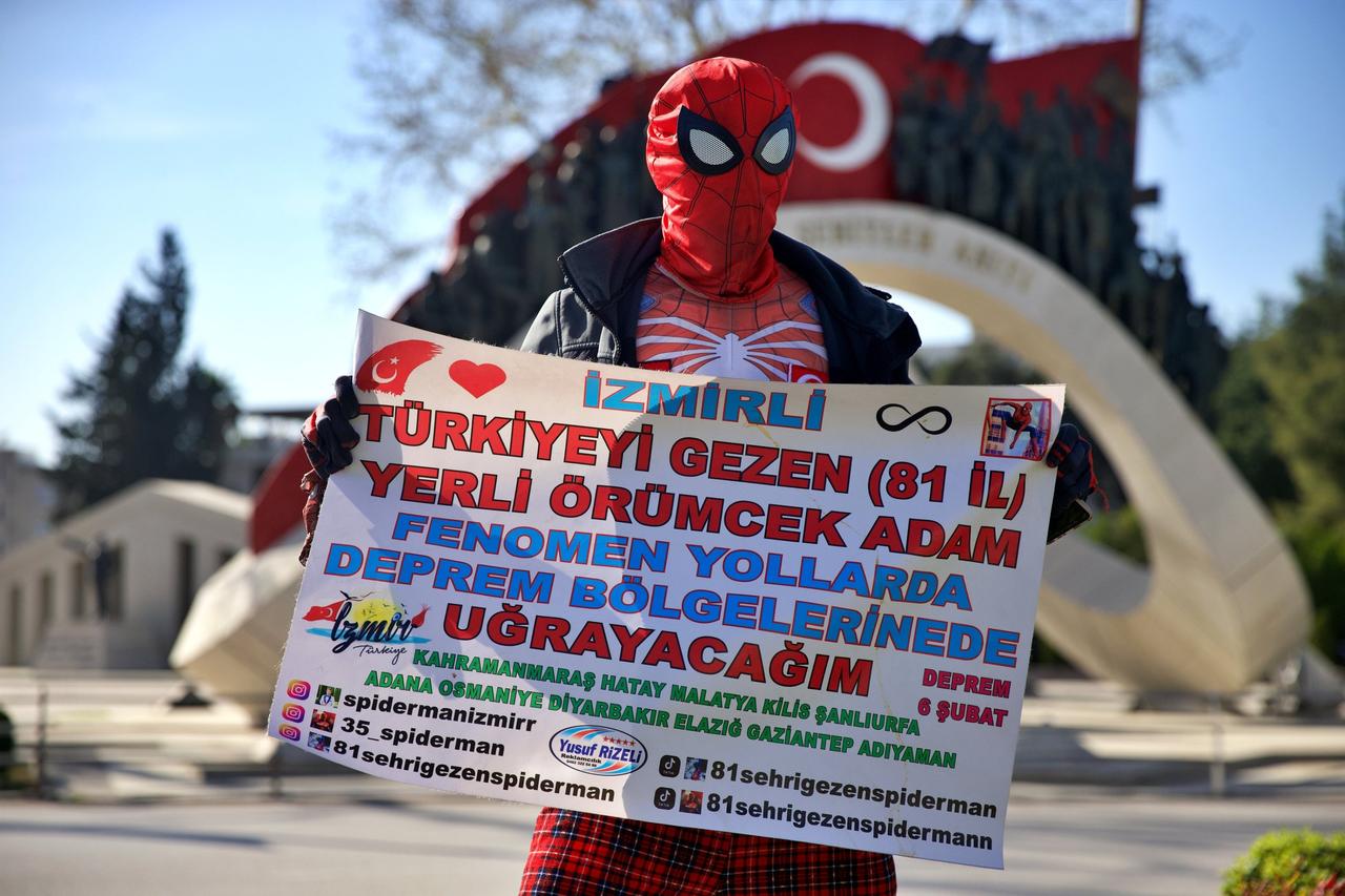 Ayaz Koc, dressed as Spider-Man, sets out from Izmir to visit 81 cities and support families affected by the 2023 Hatay earthquakes, March 30, 2024. (AA Photo)