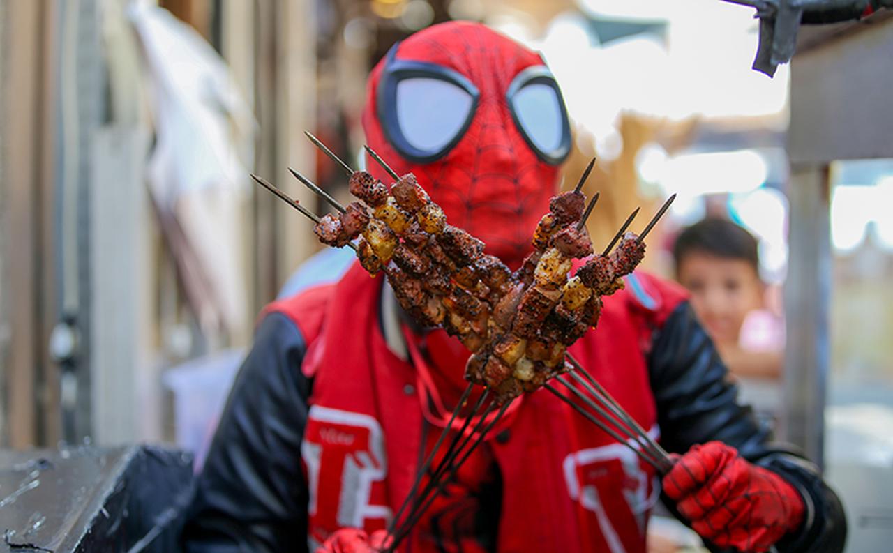The “Spider-Man” touring Türkiye meets residents in Diyarbakir, July 26, 2025. (AA Photo)