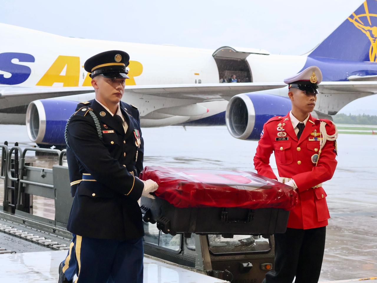 The bodies of four killed Turkish soldiers are being handed over in a ceremony, wrapped in the Turkish flag, on August 15, 2025. (AA Photo)