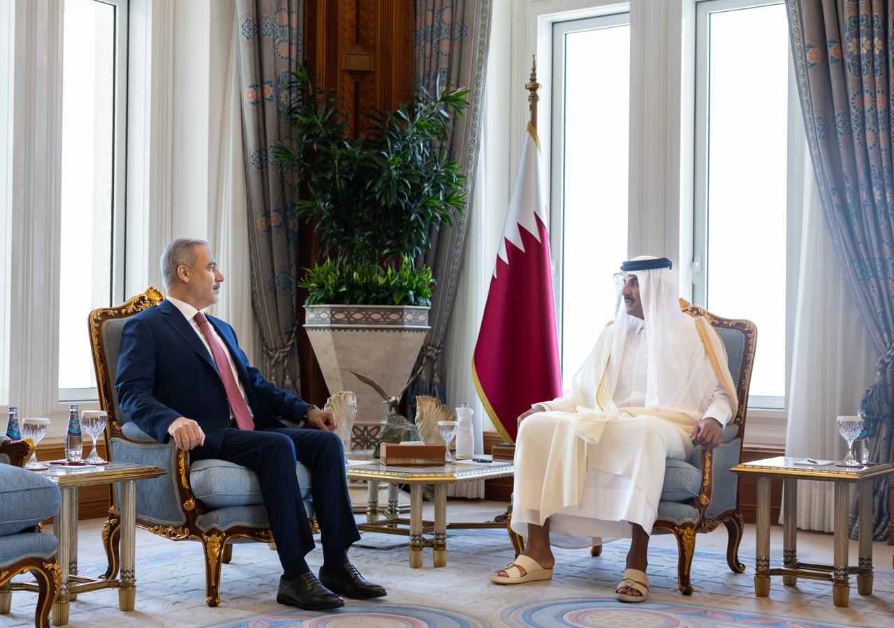 Foreign Minister Hakan Fidan (L) meets with Emir of Qatar Sheikh Tamim bin Hamad Al Thani (R) in Doha, Qatar on August 14, 2025. (AA Photo)