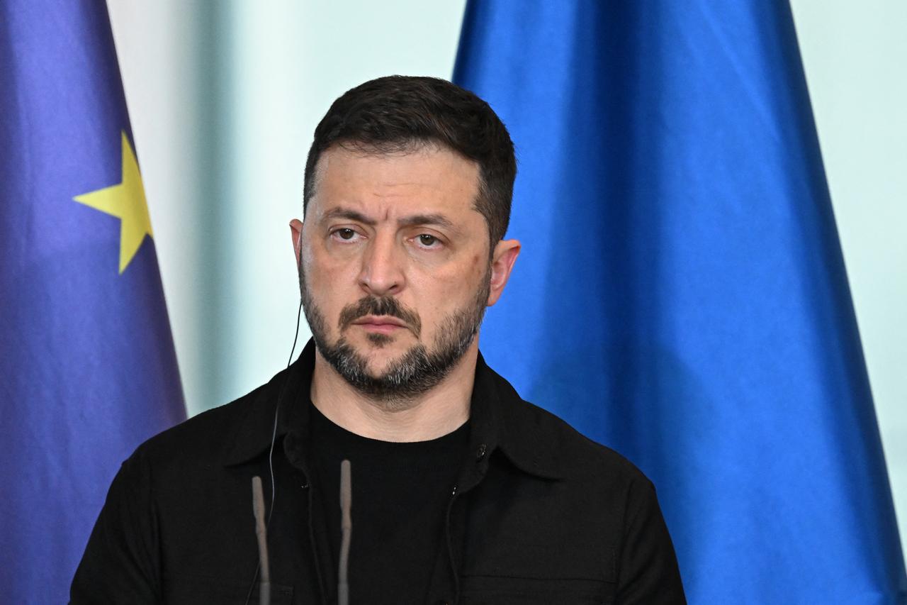Ukrainian President Volodymyr Zelenskyy looks on during a joint press conference with the German Chancellor in Berlin, on August 13, 2025. (AFP Photo)