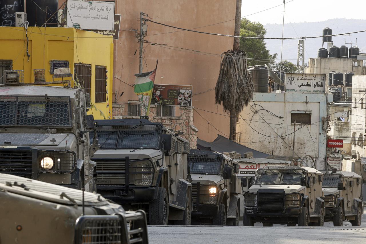 Israeli army vehicles deploy during a raid at the Palestinian Askar refugee camp east of Nablus city in the occupied West Bank on August 15, 2025. (AFP Photo)
