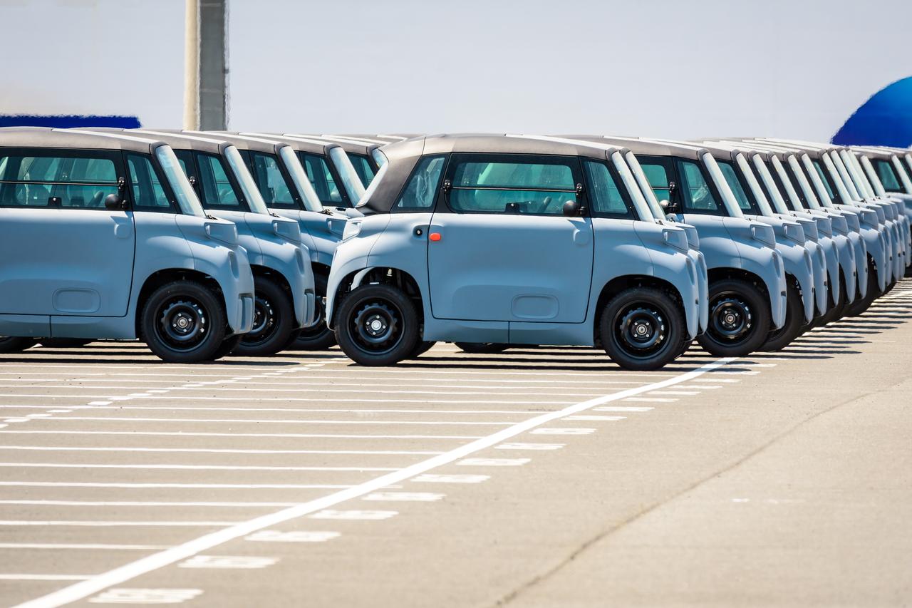 Brand new Citroen AMI electric microcars are lined up outdoors in the parking lot in Le Havre, France on June 16, 2021. (Adobe Stock Photo)