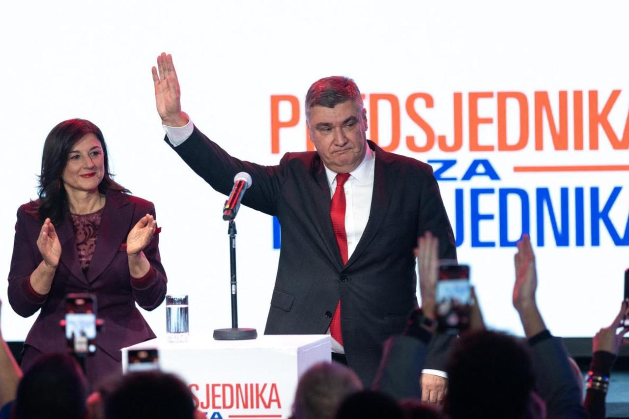 Croatias President Zoran Milanovic (R) gestures as his wife Sanja Music Milanovic (L) looks on, at his headquarters in Zagreb, Croatia, Dec. 29, 2024. (AFP Photo)