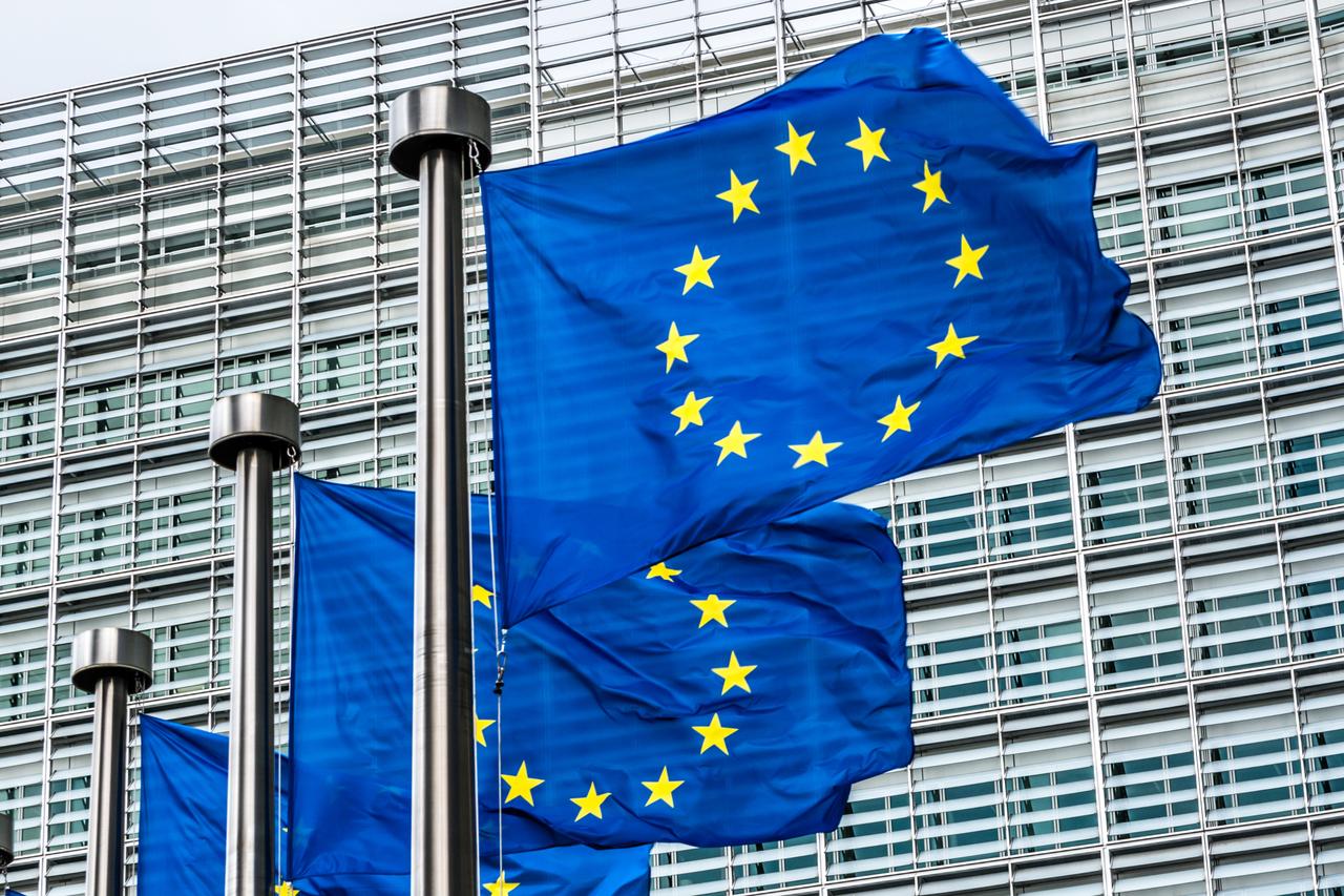 European Union flags waving in the wind. (Adobe Stock Photo)