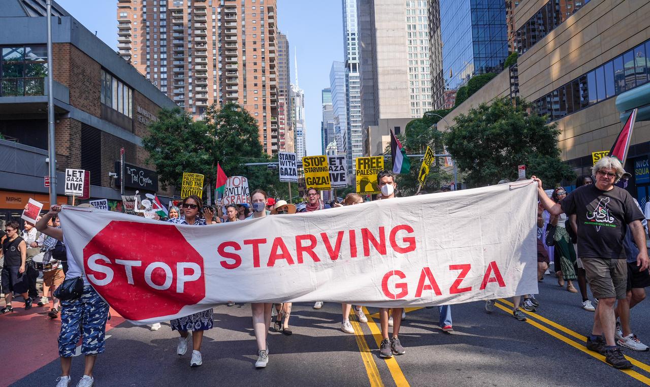 People participate in 'Stop Starving Gaza' march to protest Israeli actions and to call for an end to the starvation in Gaza on August 16, 2025 in New York, US. (AA Photo)