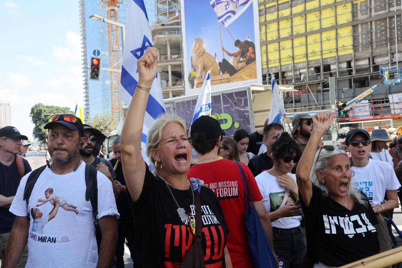 Demonstrators shout slogans during an anti-government protest demanding a deal to release Israelis detained in the Gaza Strip by Hamas militants since October 7, 2023, in Tel Aviv on August 17, 2025. (AFP Photo)