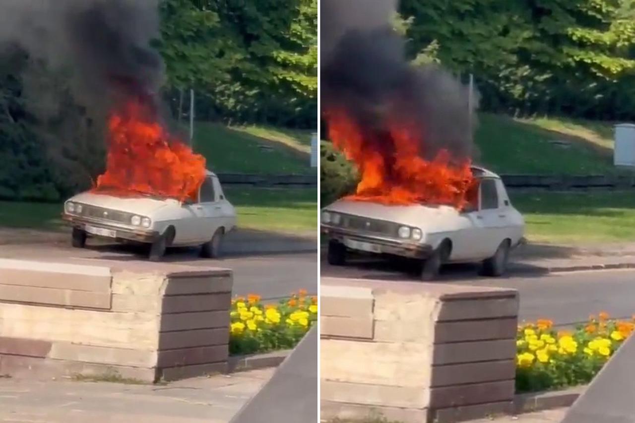Car is seen burning near Turkish Parliament in Ankara.