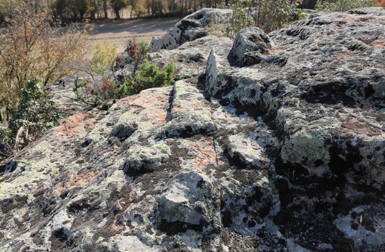 Menekse Kaya rock-cut altars with triple reliefs in Yazilikaya, Eskisehir, Türkiye. (Photo via Journal of Ancient History and Archaeology)