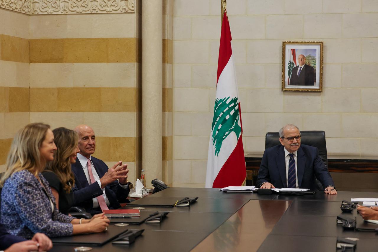 Lebanon's Prime Minister Nawaf Salam (R) holds a meeting with US ambassador to Türkiye and special envoy for Syria Tom Barrack (C) and US deputy Middle East envoy Morgan Ortagus (2L) in Beirut on August 18, 2025. (AFP Photo)