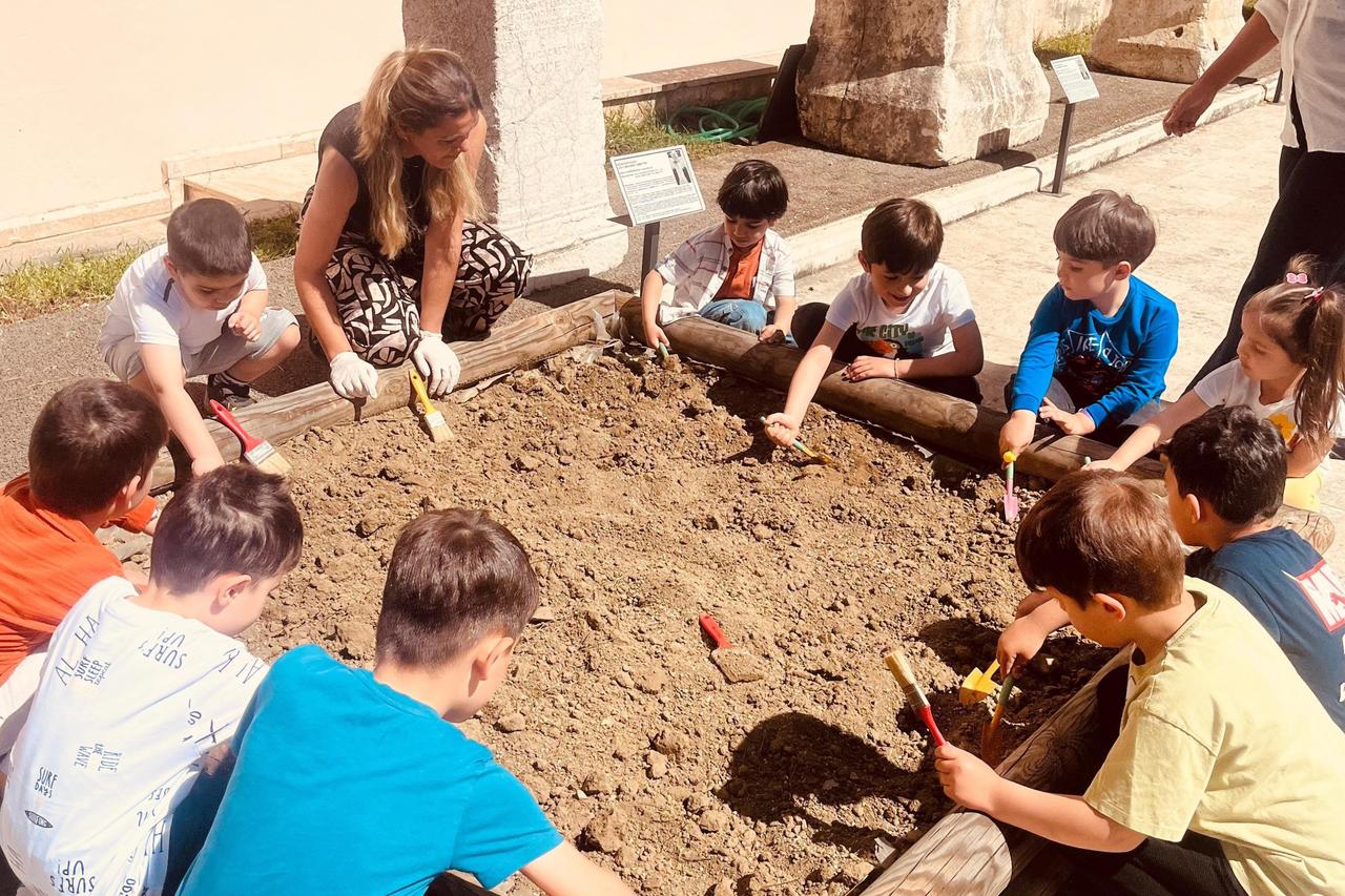 During an event organized by a kindergarten in Türkiye, young students conduct a mock excavation at the Bilecik Archaeology and Ethnography Museum, May 29, 2025. (IHA Photo)
