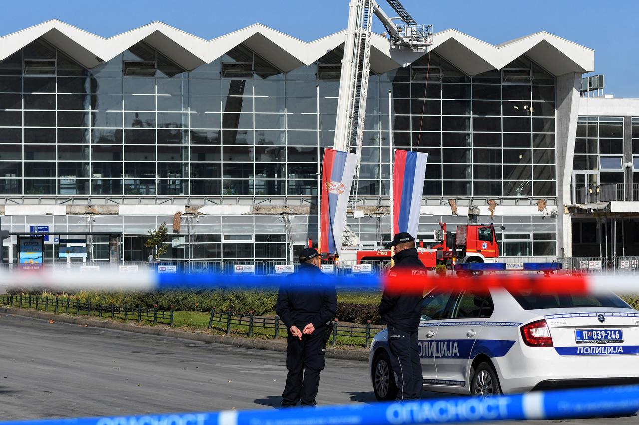 Policemen stand guard outside a train station, the day after an outdoor roof collapsed leaving at least 14 people killed and several people injured, according to emergency services in the area in the northern Serbian city of Novi Sad on November 2, 2024. (AFP Photo)