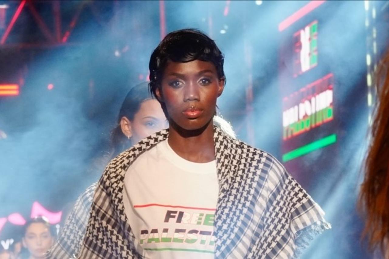 Models wear keffiyehs in powerful show of support for Gaza in Istanbul Image