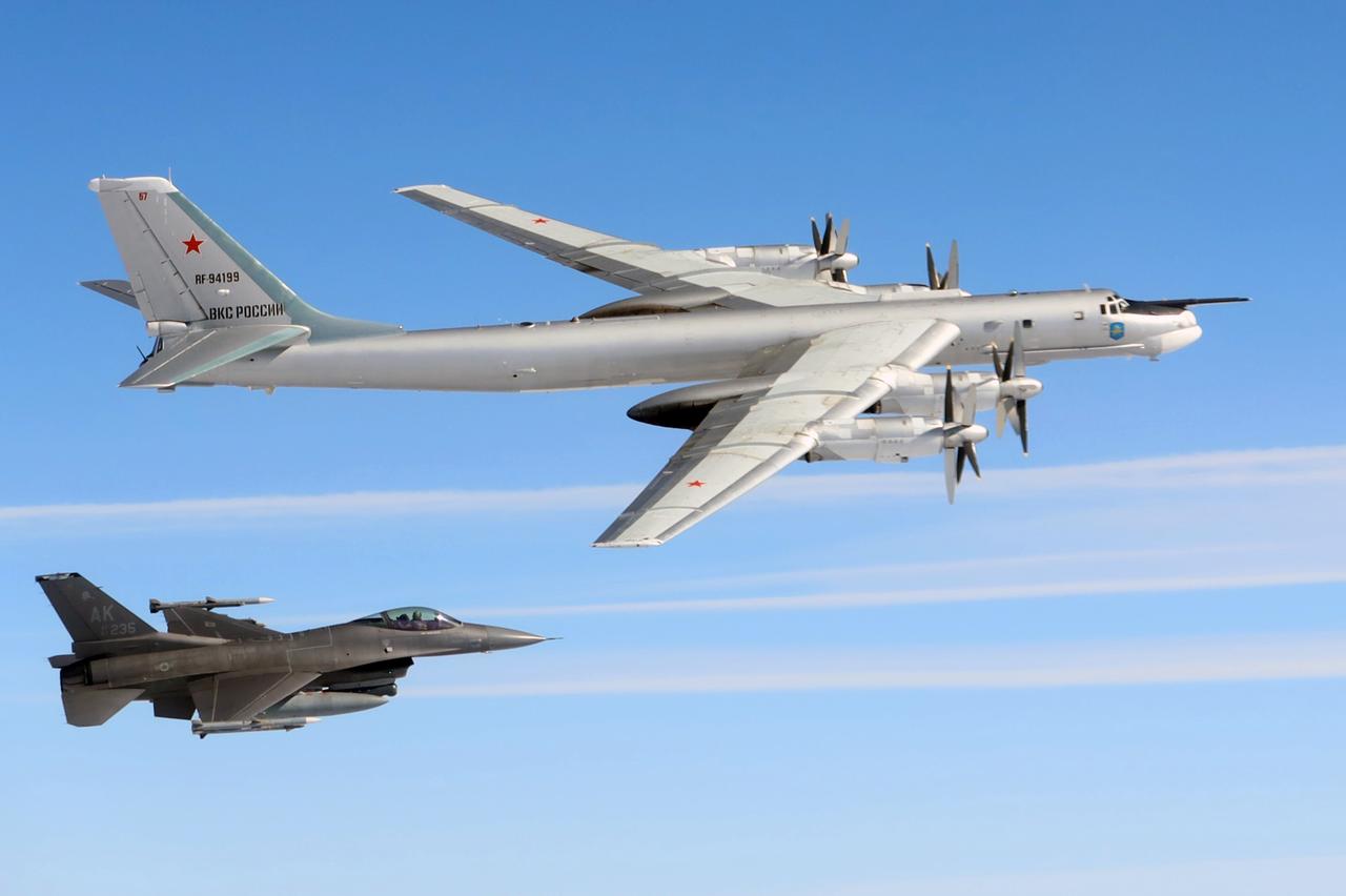 A U.S. Air Force F-16 Fighting Falcon assigned to the North American Aerospace Defense Command (NORAD) intercepts a Russian Tu-95 bomber over the Bering Sea, July 22, 2025. (Photo via US Department of Defense)