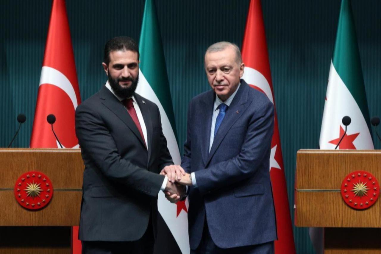 President Recep Tayyip Erdogan (R) and Syrian President Ahmad al-Sharaa (L) shake hands as they hold a joint press conference after their meeting at Presidential Complex in Ankara, Türkiye Feb. 4, 2025. (AA Photo)