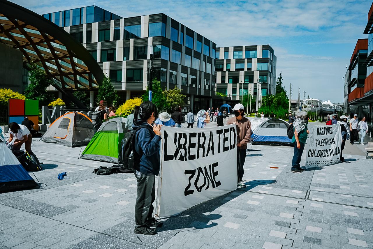 Protesters from No Azure for Apartheid  set up tents and displays at East Campus Plaza in Redmond, Washington on 20 August, 2025. (Photo via No Azure for Apartheid)