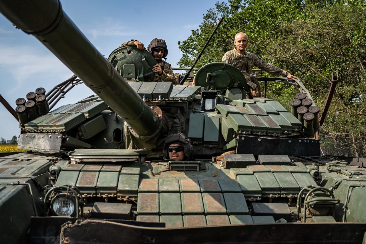 Ukrainian soldiers service their tanks and armored vehicles in the Kherson region, Ukraine on August 8, 2025. (AA Photo)