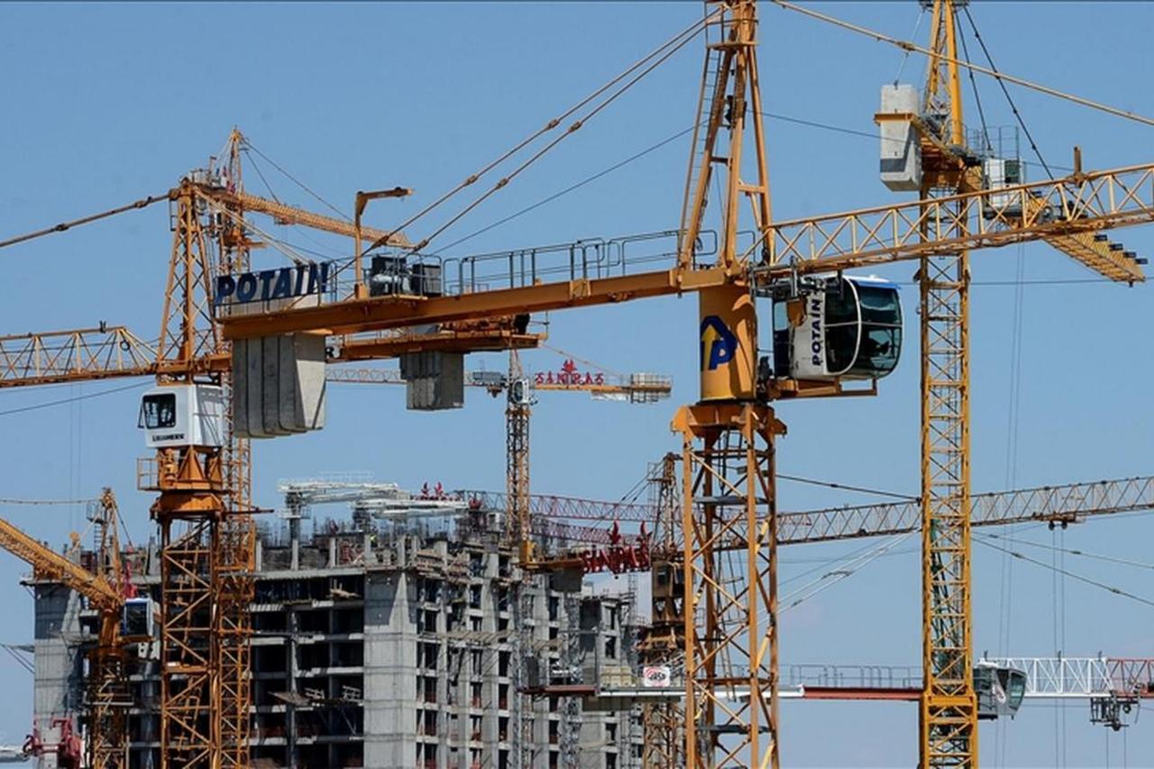 High-rise residential and commercial buildings under construction with multiple cranes in operation in Türkiye. (AA Photo)