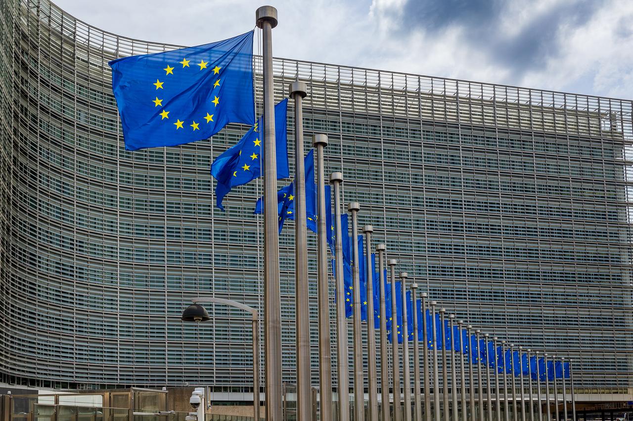EU flags flutter outside the Berlaymont, the European Commission’s main headquarters in Brussels, Bulgaria. (Adobe Stock Photo)