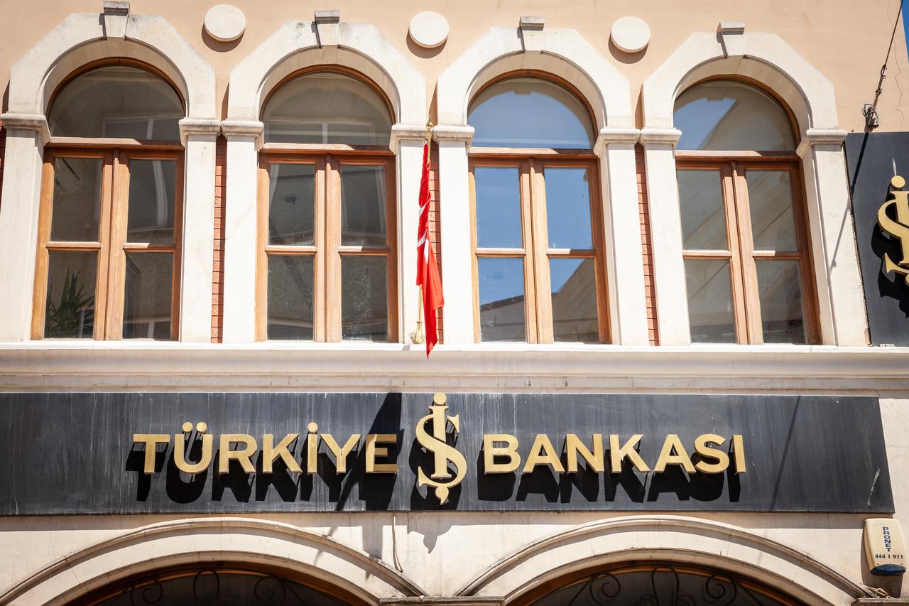 Türkiye İsbank's logo on the facade of a branch office in Istanbul, Türkiye.(Adobe Stock Photo)