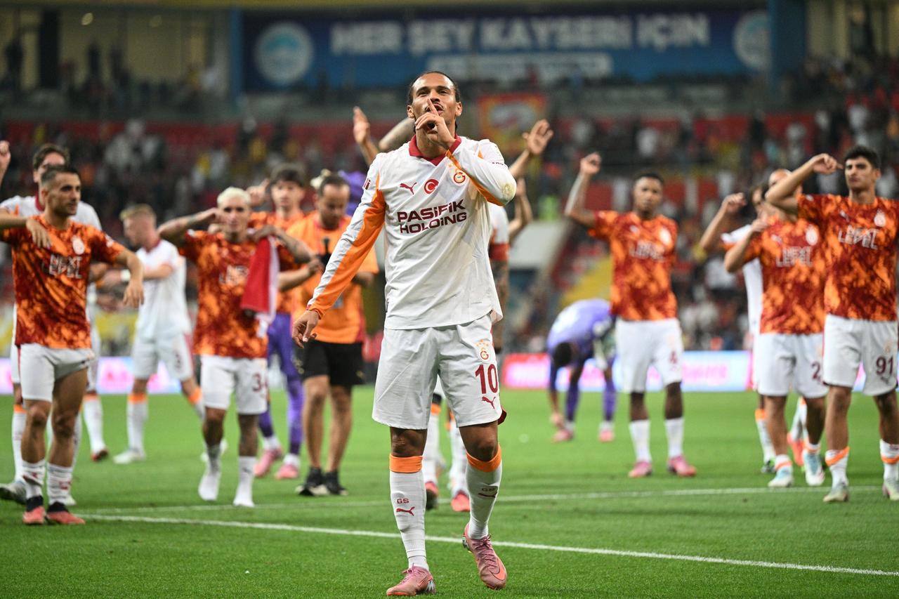 Players of Galatasaray celebrate their victory at the end of Turkish Super Lig week 3 football match between Zecorner Kayserispor and Galatasaray at RHG EnerTurk Stadium in Kayseri, Türkiye on August 24, 2025. (AA Photo)