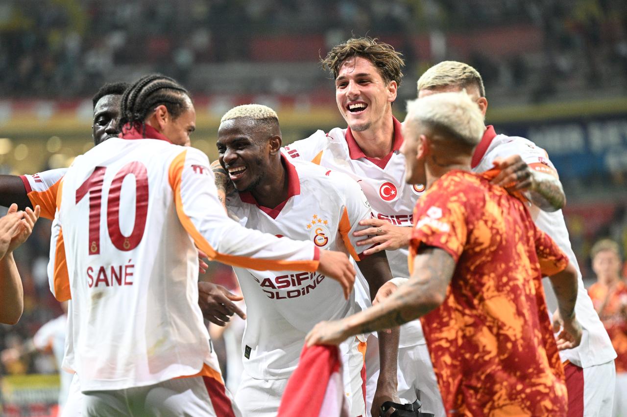 Players of Galatasaray celebrate their victory at the end of Turkish Super Lig week 3 football match between Zecorner Kayserispor and Galatasaray at RHG EnerTurk Stadium in Kayseri, Türkiye on August 24, 2025. (AA Photo)