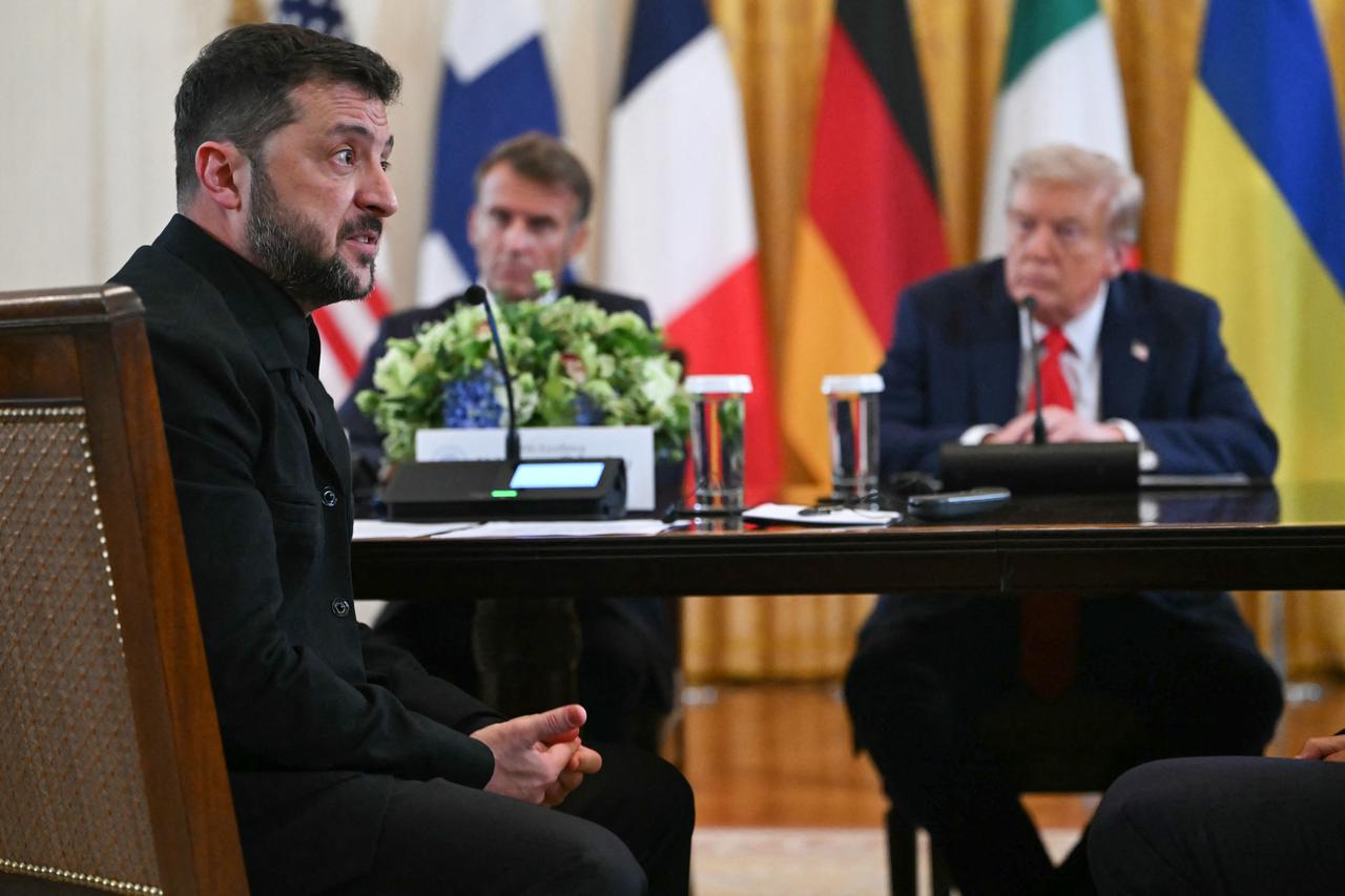 (L/R) Ukrainian President Volodymyr Zelenskyy speaks as French President Emmanuel Macron and US President Donald Trump during a meeting in Washington, DC, August 18, 2025. (AFP Photo)