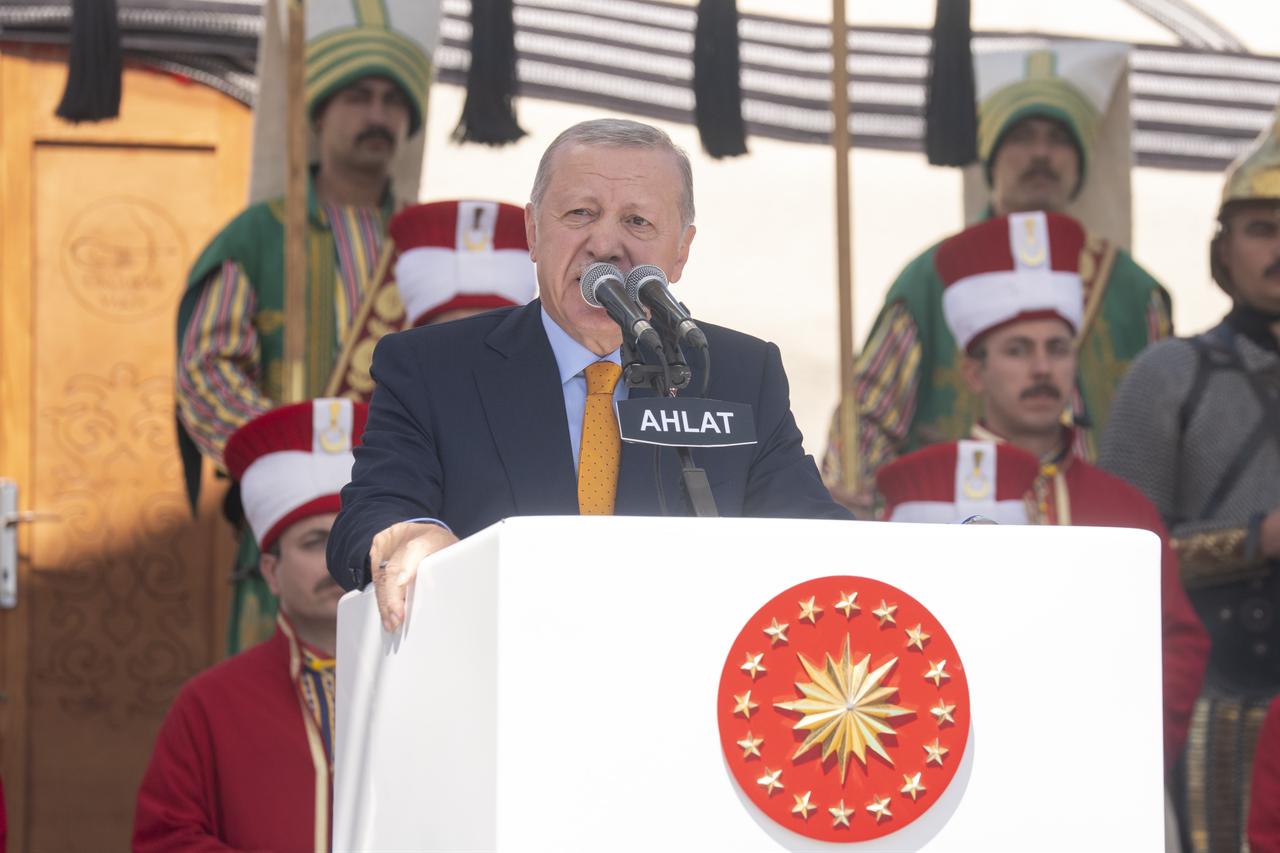President Erdogan (R) makes a speech as he attends a ceremony marking the 954th anniversary of the Manzikert (Malazgirt) Victory in Ahlat district of Bitlis, Türkiye, August 25, 2025. (AA Photo)