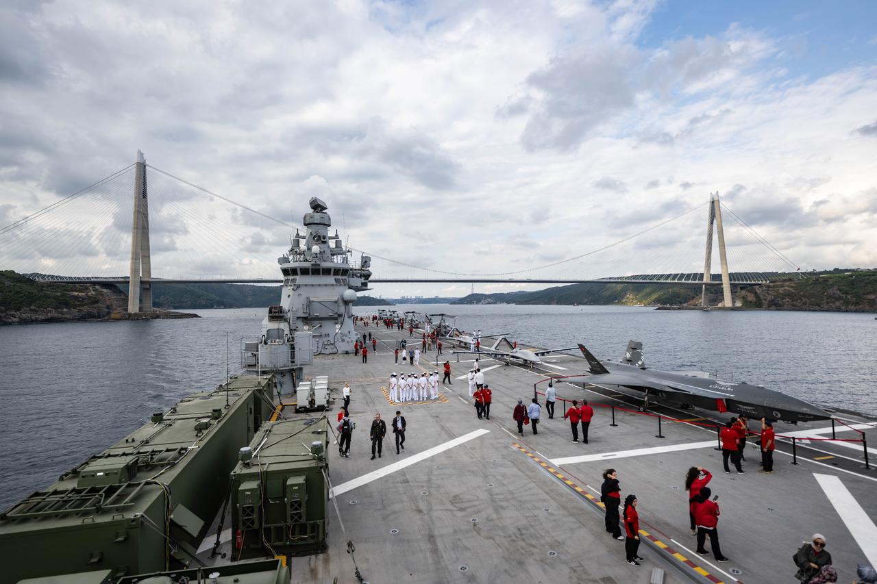 Türkiye’s largest warship, the amphibious assault ship TCG Anadolu, sails through the Istanbul Strait and heads toward the Black Sea on August 24, 2025, in Istanbul, Türkiye. (AA Photo)