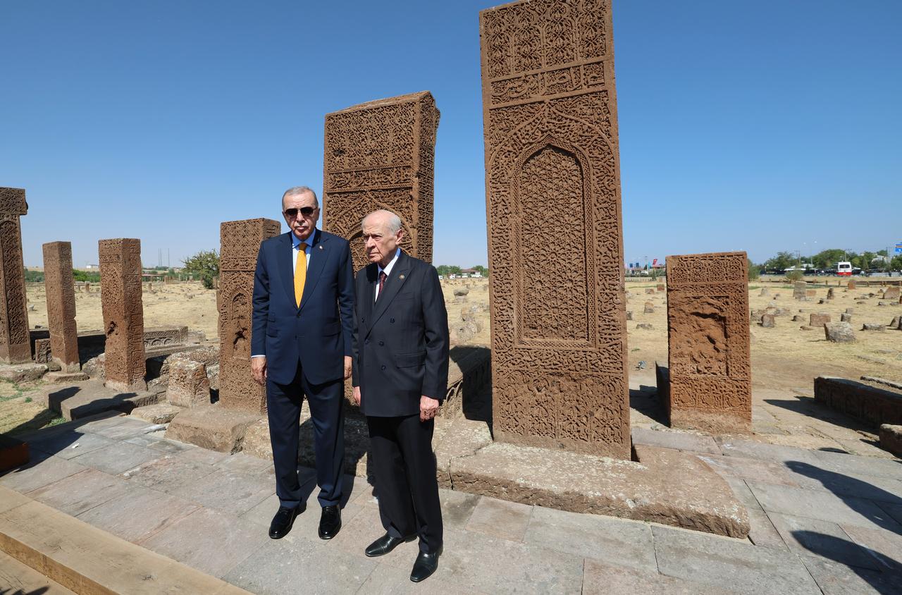 Turkish President Recep Tayyip Erdogan (L) and Türkiye's Nationalist Movement Party (MHP) leader Devlet Bahceli (R) visit the Ahlat Seljuk Cemetery within the 954th anniversary of the Manzikert (Malazgirt) Victory in Bitlis, Türkiye, Aug. 25, 2025. (AA Photo)