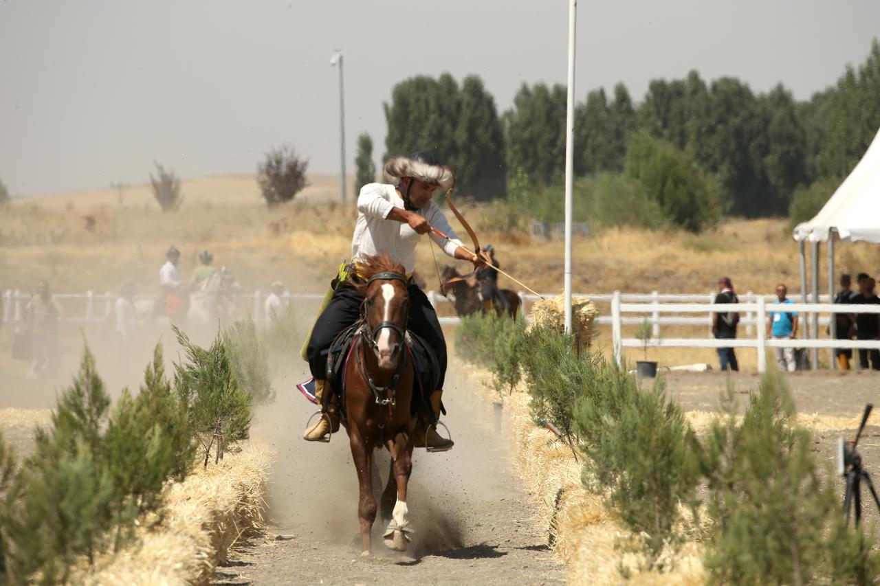 Equestrian archery competition is held at the hippodrome as a part of the 954th Manzikert (Malazgirt) Victory celebration in Mus, Türkiye, Aug. 23, 2025. (AA Photo)